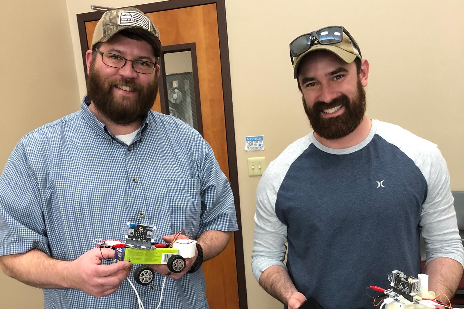 Teachers with their coded seed planter robots